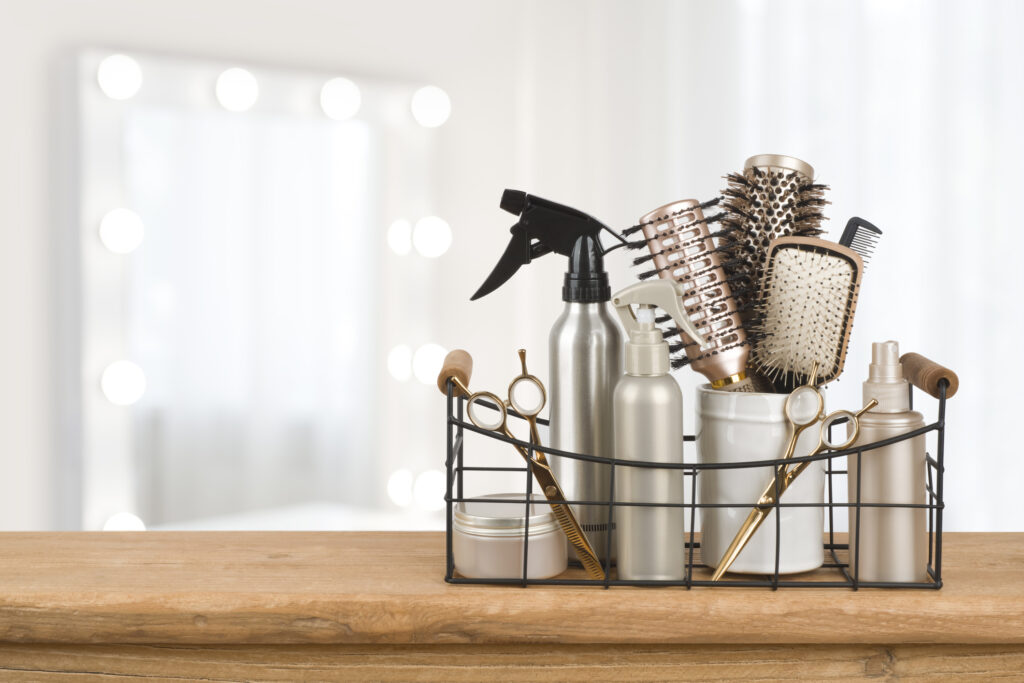 A basket of hair tools used by a hairdresser.