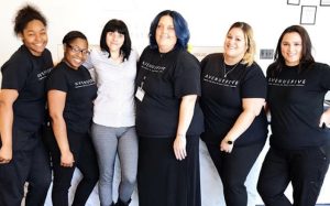 Team photo of the Avenue Five Institute staff, showcasing a group of professional and friendly team members.
