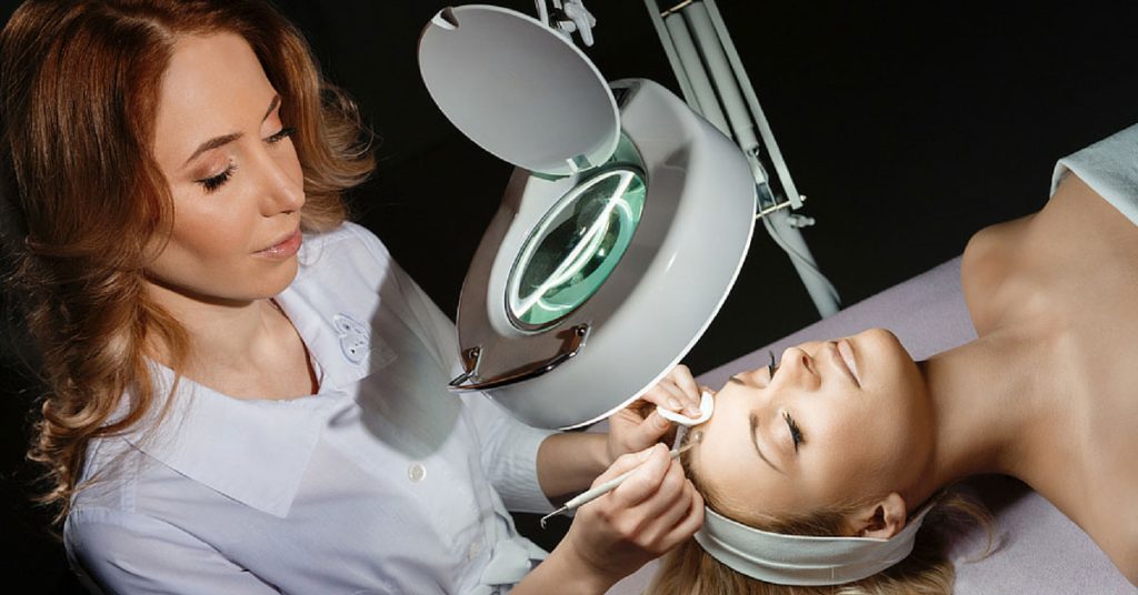 avenue five professional doing a facial