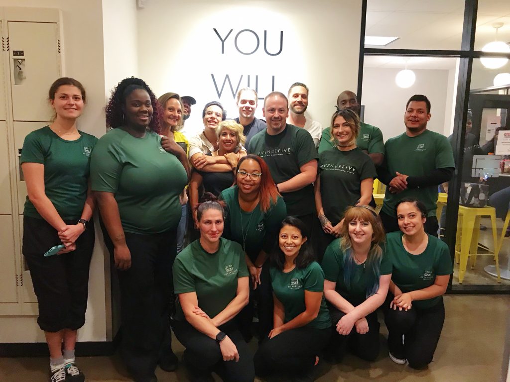 Massage Therapy Course Students Learning Hands-On