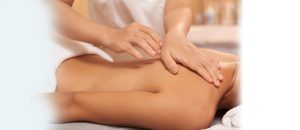 a woman getting a back massage