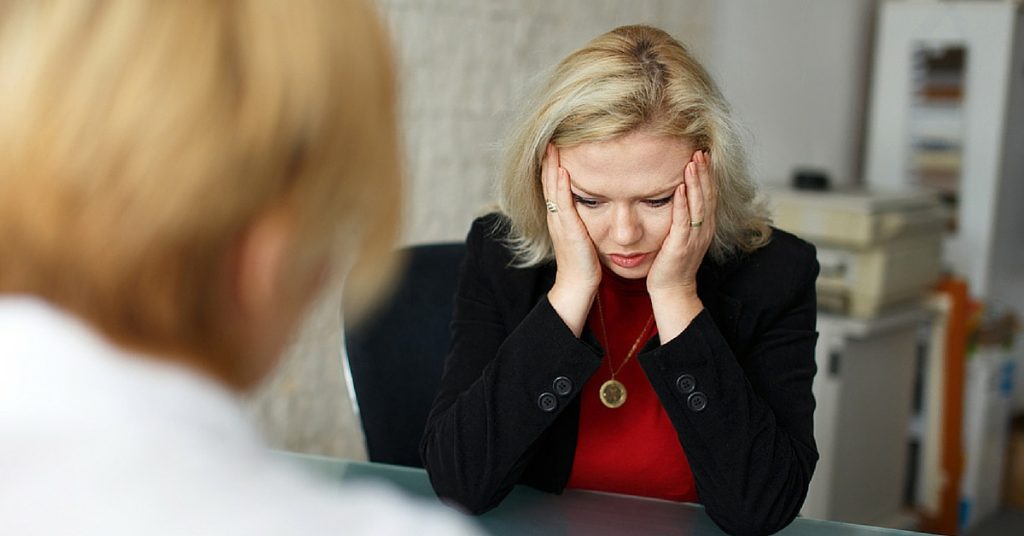 Stressed , middle-aged woman