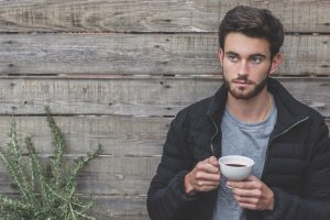 A guy drinking coffee