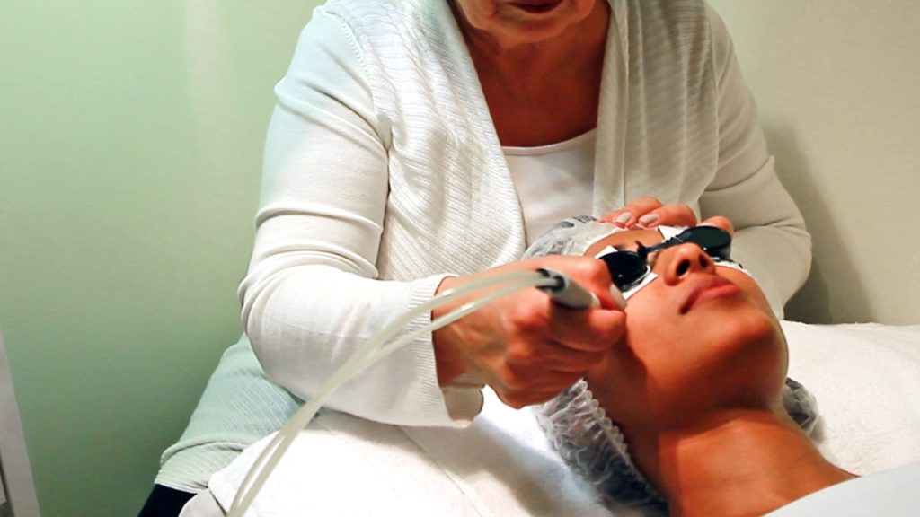 a woman getting laser done