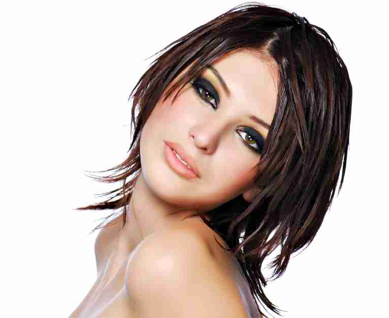 a woman with short hair posing