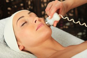 a woman getting a facial