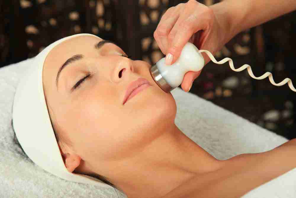 a woman getting a facial