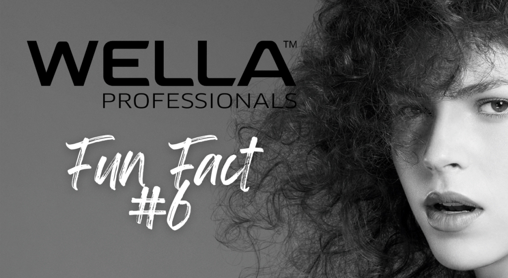 Black and white picture of a women with curly hair's profile